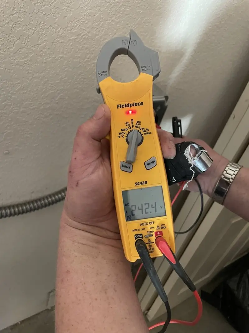 Voltage testing with clamp meter during Generator Installation in Lindale